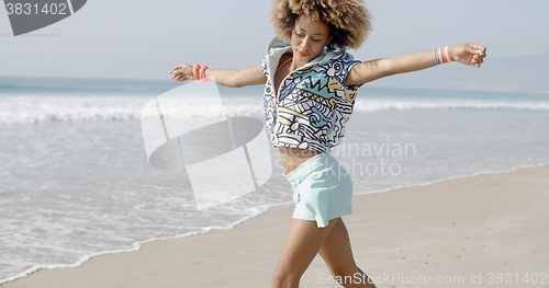 Image of Woman Dancing On The Tropical Beach
