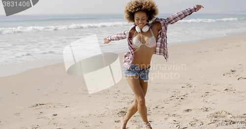 Image of Woman Relaxing On The Beach