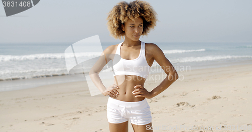 Image of Woman Looking To Camera On The Beach