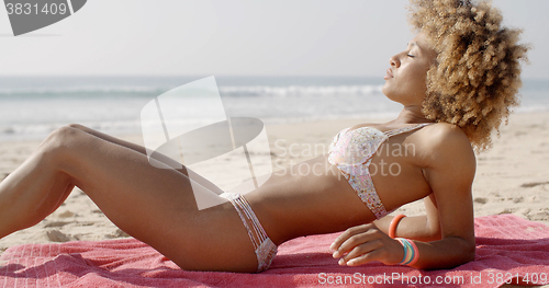 Image of Woman On The Beach