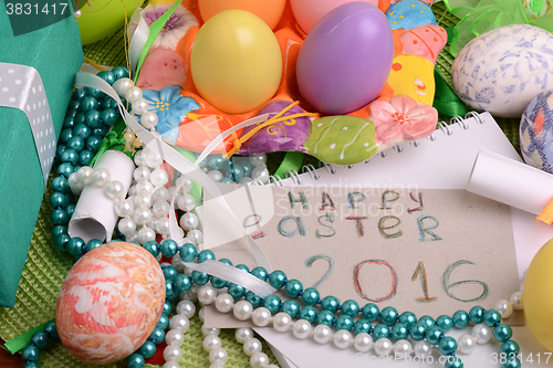 Image of invitation card with easter eggs 