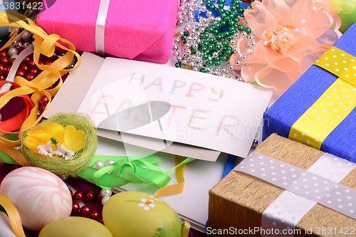 Image of Easter background with eggs, ribbons and spring decoration