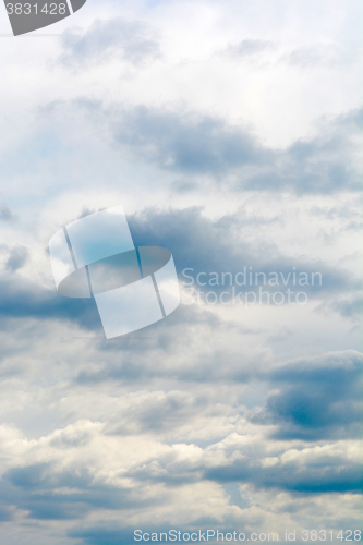 Image of blue sky background with tiny clouds