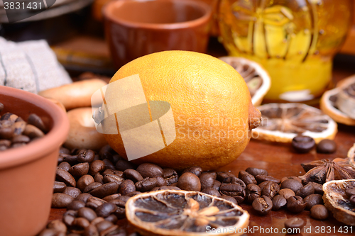 Image of Vintage still life with coffee beans on wooden background