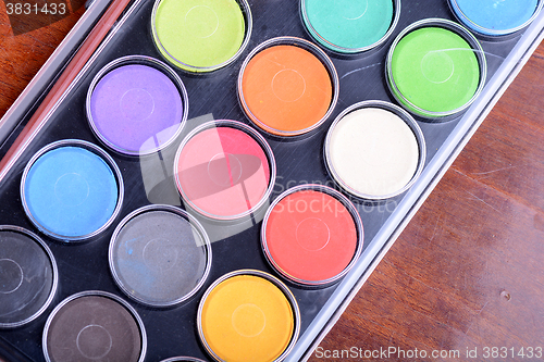 Image of set of watercolor paints close up