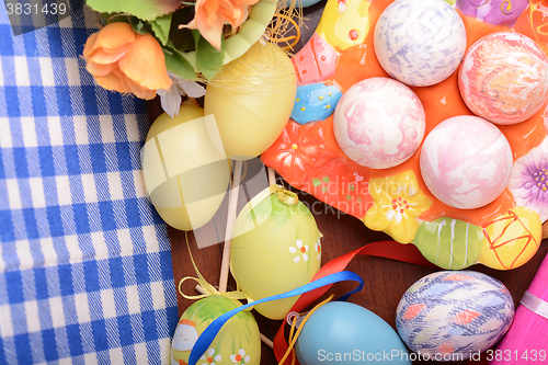 Image of Easter background with eggs, ribbons and spring decoration