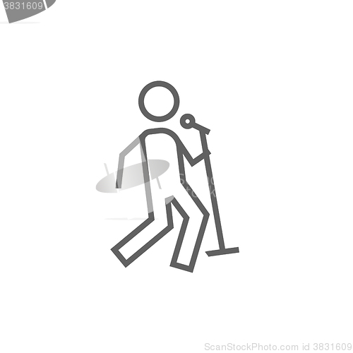 Image of Man singing with microphone line icon.
