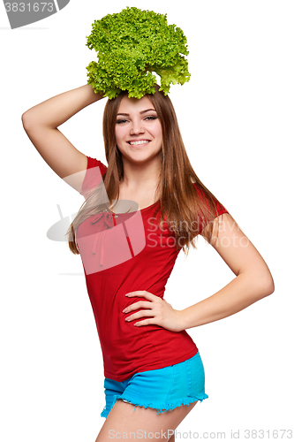 Image of Happy woman with lettuce