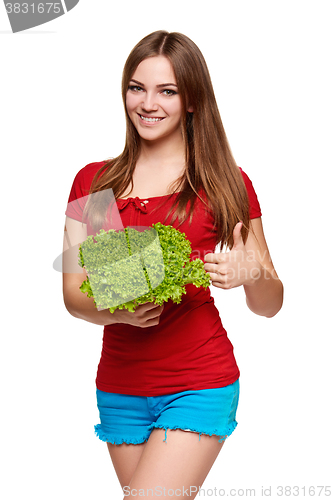 Image of Happy woman with lettuce