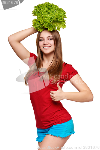 Image of Happy woman with lettuce