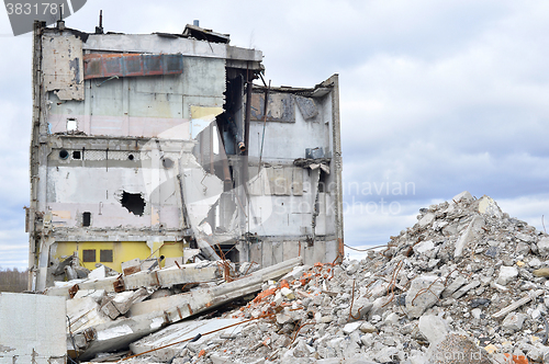 Image of Pieces of Metal and Stone are Crumbling from Demolished Building Floors