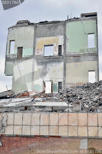 Image of Pieces of Metal and Stone are Crumbling from Demolished Building Floors