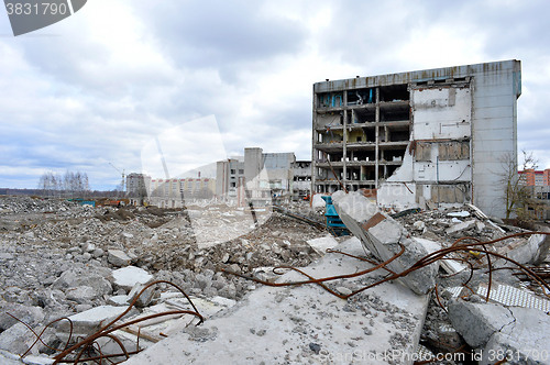 Image of Pieces of Metal and Stone are Crumbling from Demolished Building Floors