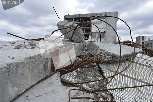 Image of Pieces of Metal and Stone are Crumbling from Demolished Building Floors