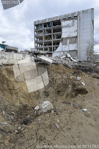 Image of Pieces of Metal and Stone are Crumbling from Demolished Building Floors