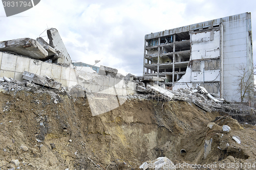 Image of Pieces of Metal and Stone are Crumbling from Demolished Building Floors