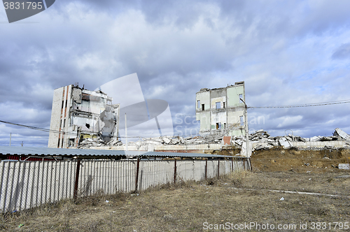 Image of Pieces of Metal and Stone are Crumbling from Demolished Building Floors