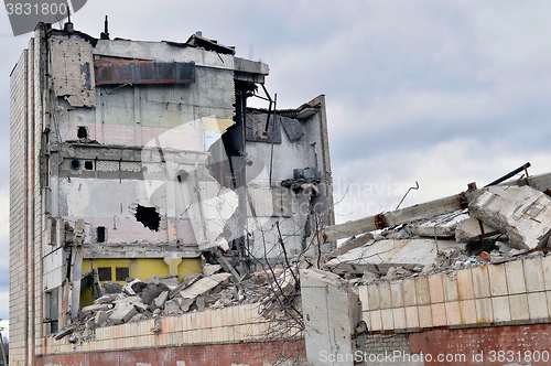 Image of Pieces of Metal and Stone are Crumbling from Demolished Building Floors