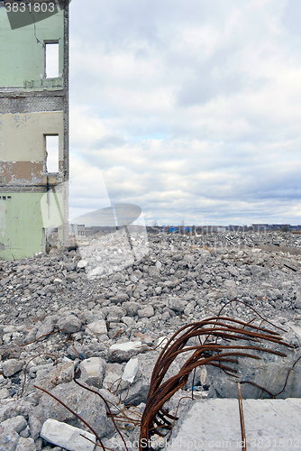 Image of Pieces of Metal and Stone are Crumbling from Demolished Building Floors