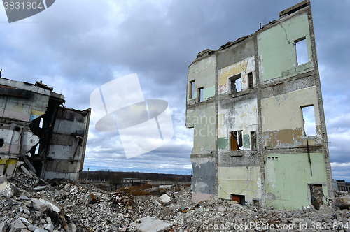 Image of Pieces of Metal and Stone are Crumbling from Demolished Building Floors