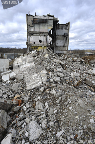 Image of Pieces of Metal and Stone are Crumbling from Demolished Building Floors