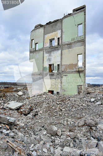 Image of Pieces of Metal and Stone are Crumbling from Demolished Building Floors