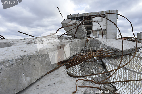 Image of Pieces of Metal and Stone are Crumbling from Demolished Building Floors