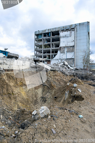 Image of Pieces of Metal and Stone are Crumbling from Demolished Building Floors