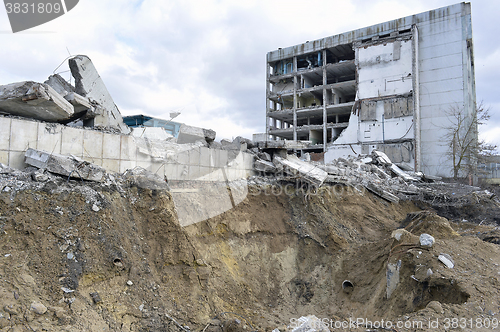 Image of Pieces of Metal and Stone are Crumbling from Demolished Building Floors