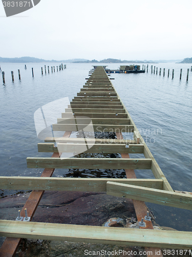 Image of building a new pier on the water