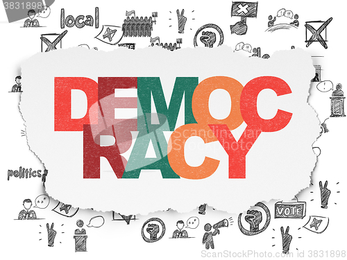 Image of Political concept: Democracy on Torn Paper background