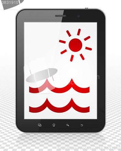 Image of Vacation concept: Tablet Pc Computer with Beach on display