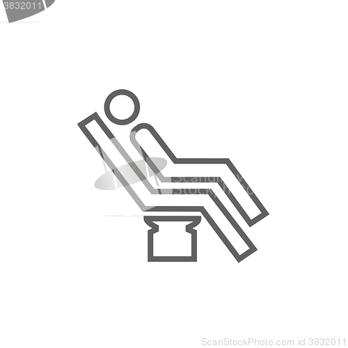 Image of Man sitting on dental chair line icon.