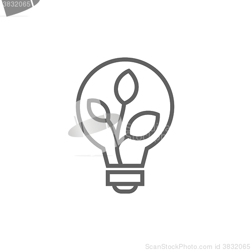 Image of Lightbulb and plant inside line icon.