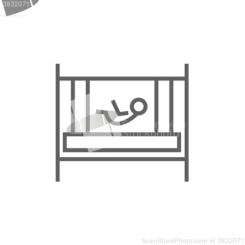 Image of Baby laying in crib line icon.