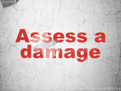 Image of Insurance concept: Assess A Damage on wall background