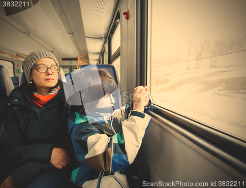 Image of Mother and son in a railway carriage