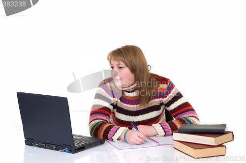 Image of Girl student doing schoolwork