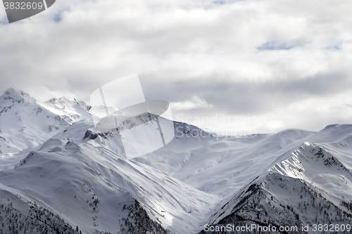 Image of Evening sunlight mountains in haze