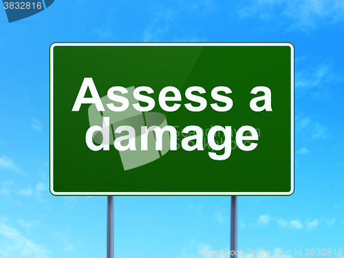 Image of Insurance concept: Assess A Damage on road sign background
