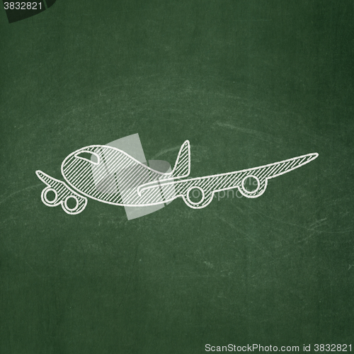 Image of Travel concept: Airplane on chalkboard background