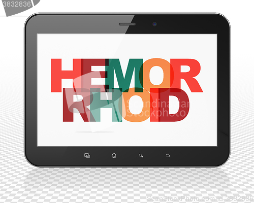 Image of Healthcare concept: Tablet Pc Computer with Hemorrhoid on  display