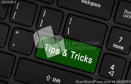 Image of Black conceptual keyboard - Tips and Tricks (green key)