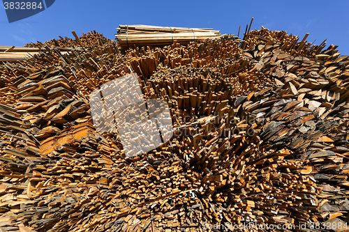 Image of Low angle view of stacked planks