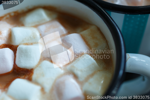 Image of Two mugs of hot cacao with marshmallow