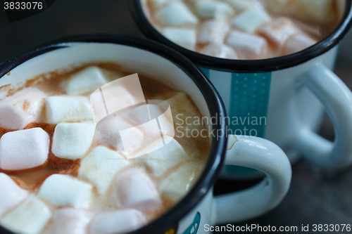 Image of Two mugs of hot cacao with marshmallow