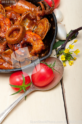 Image of fresh seafoos stew on an iron skillet