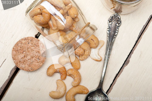 Image of cashew nuts on a glass jar 