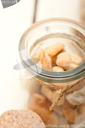 Image of cashew nuts on a glass jar 