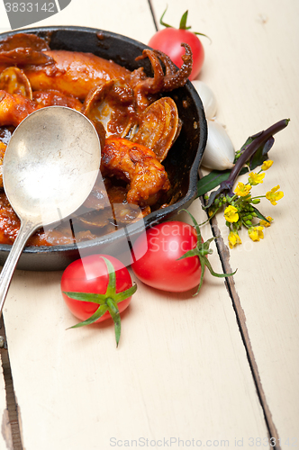 Image of fresh seafoos stew on an iron skillet